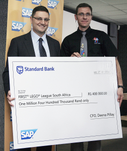 SAP Africa - Derek Kudsee handing cheque to FLL Johannes de Vries