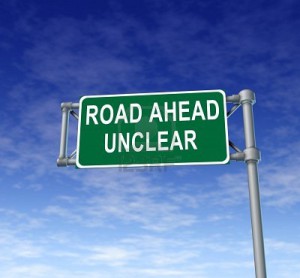 unclear-green-freeway-sign-representing-uncertainty-in-financial-business